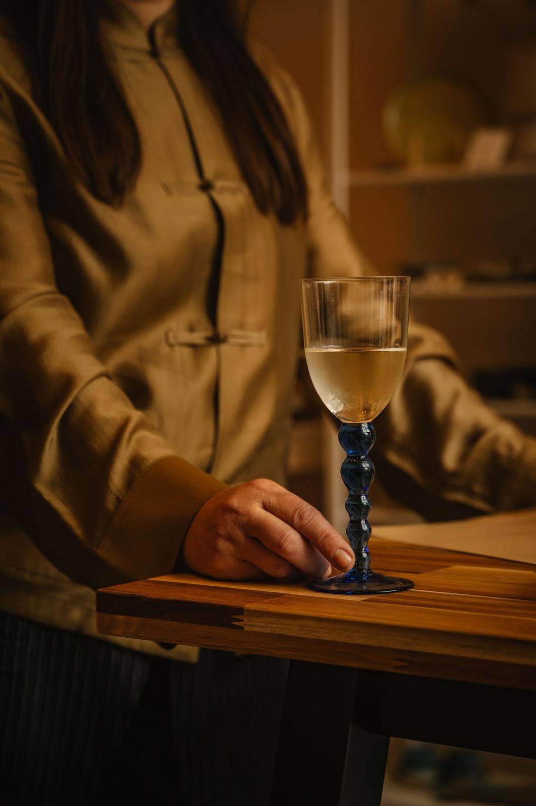 A glass of wine in the evening studio