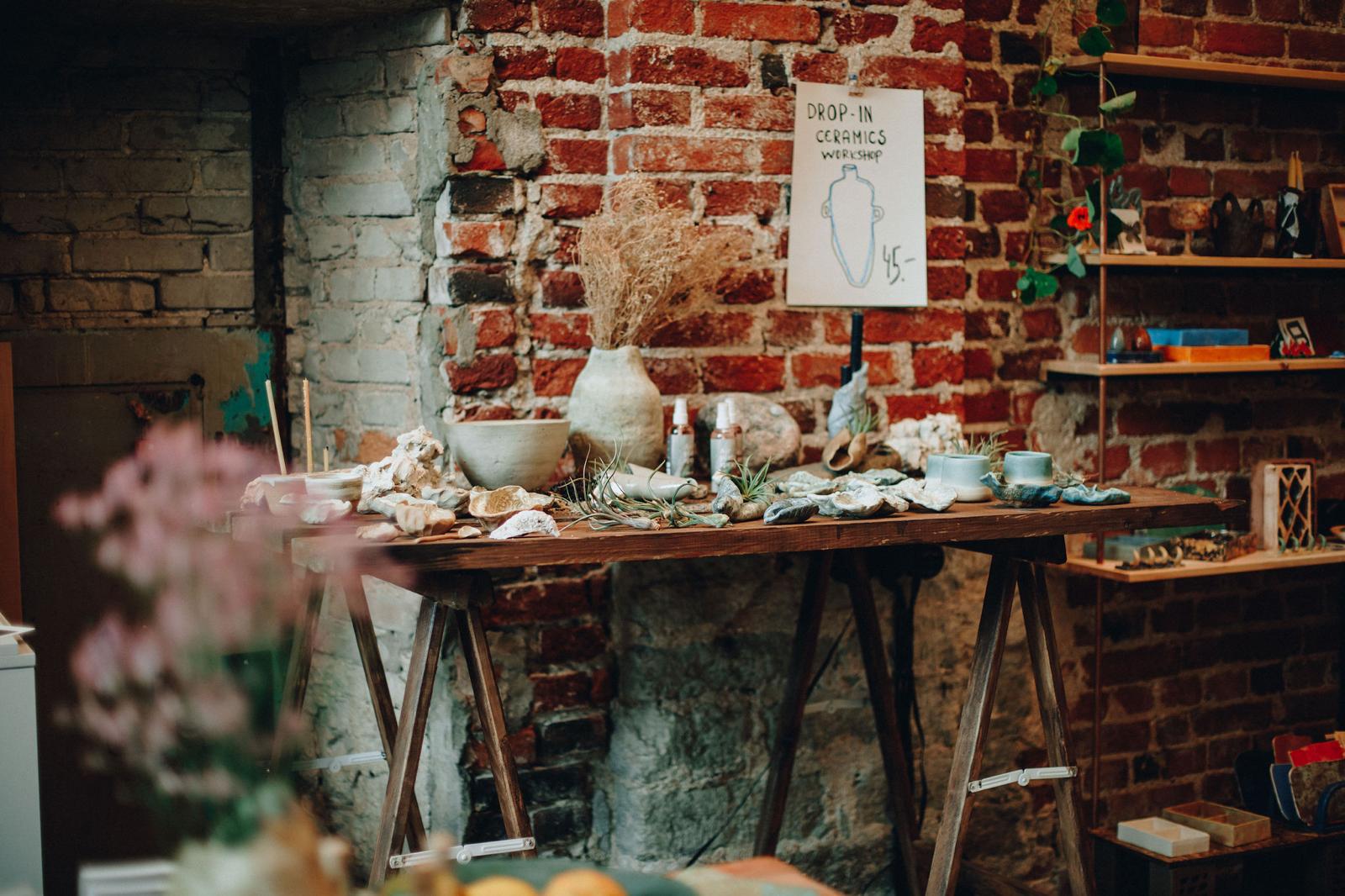 Studio corner with a brick wall